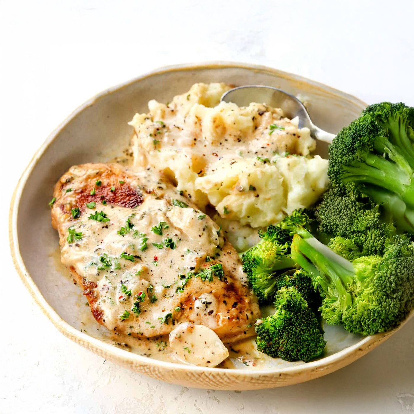 Garlic Parmesan Chicken with mash potato and Brockley