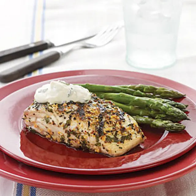 image of amberjack with a spice blend and dijon cream sauce and asparagus